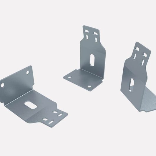 Three views of a formed sheet-metal bracket with slotted holes and lanced tabs